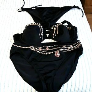 Black bikini bathing suit with gold & pearls.